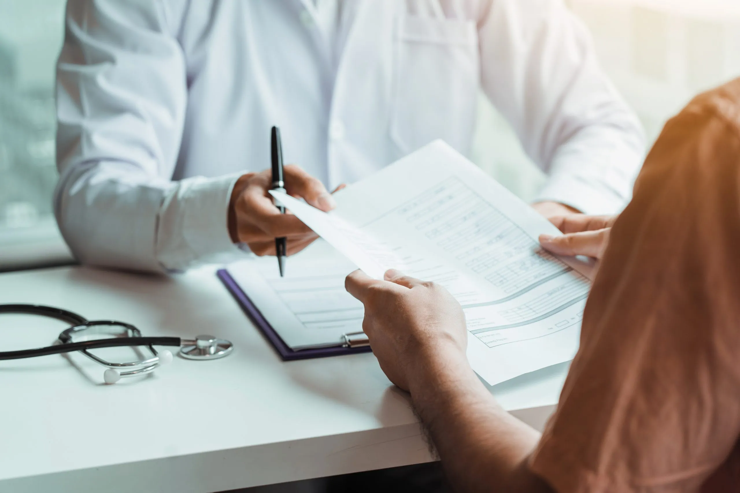 An occupational health professional reviewing a fit note
