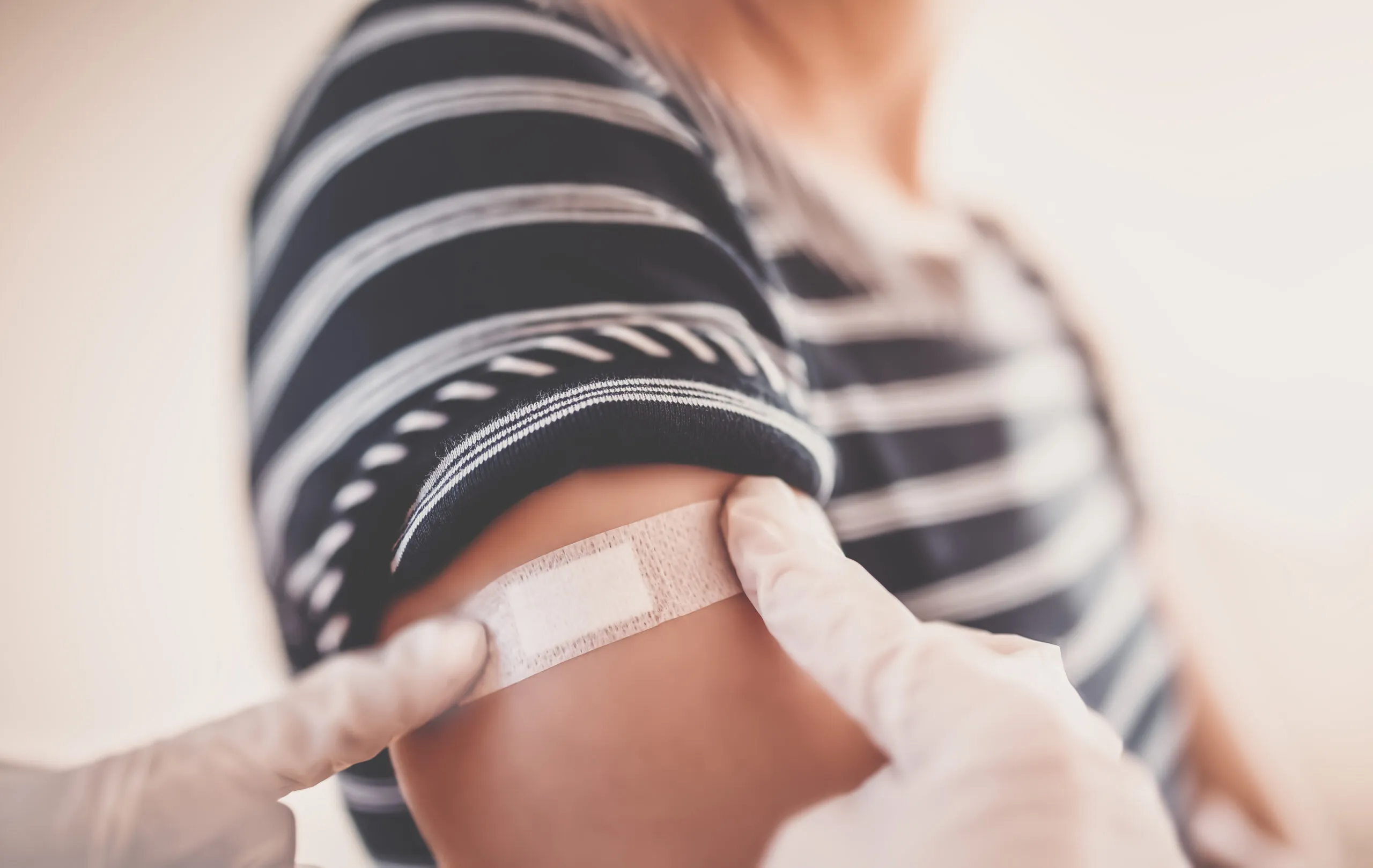 A workplace flu vaccination being administered