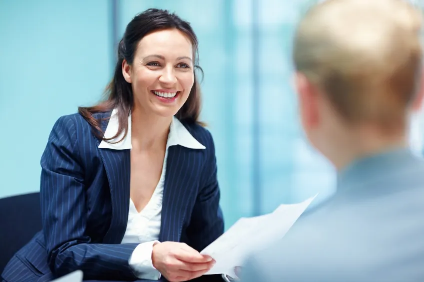 An occupational health professional reviewing a fit-note with a client